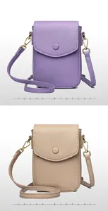 Detail view of purple and light khaki leather phone bags with textured finish and buckle