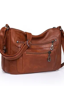 Fashionable brown faux leather crossbody bag with vintage texture and multi-pocket design