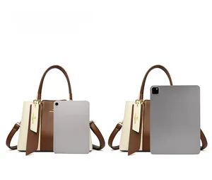 Contrast color handbag size comparison with iPad showing large capacity storage