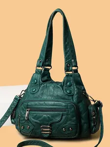 Sac à bandoulière vintage en cuir vert foncé pour femme avec fermetures éclair et rivets