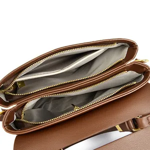 Borsa a medico vintage in pelle marrone con una struttura interna a cinque strati