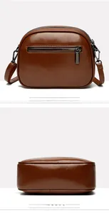 Detailed back and bottom views of a brown oil wax leather crossbody bag for women