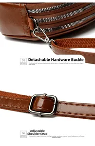 Detail of adjustable shoulder strap and gunmetal hardware on brown leather bag