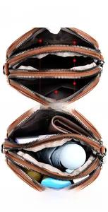 Three-layer brown leather crossbody bag showing large storage capacity for daily essentials