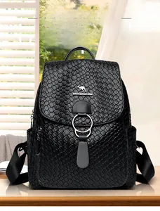 Detail of black woven leather backpack with metal kangaroo logo and zipper pocket