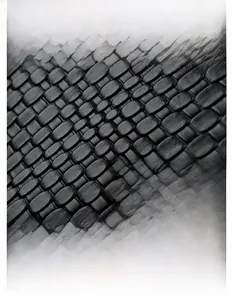 Detail of soft black woven leather backpack texture showing durability and flexibility