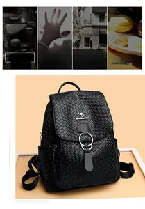 Detail of black woven texture backpack with silver kangaroo logo and metal ring accent