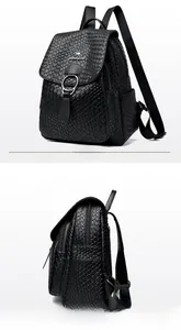 Detail view of black faux leather backpack featuring woven texture and crocodile pattern