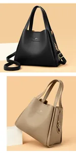 Close-up of litchi grain leather texture and embossed kangaroo logo on bucket bags
