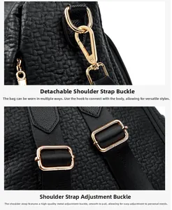 Close-up of golden metal hooks and adjustable strap on black lychee pattern leather bag