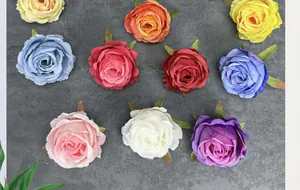Detailed top view of multi-colored silk rose heads showing realistic fabric textures