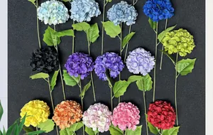 Detail of multi-colored faux hydrangea stems showing realistic silk petals and vibrant hues