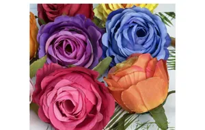 Close-up of vibrant multi-colored silk rose heads for DIY wedding floral arrangements