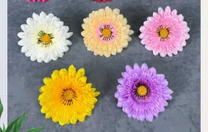 Detailed view of colorful silk daisy flower heads for DIY headbands and decor