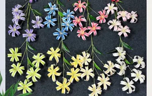 Detailed view of colorful 5-head artificial lilies in silk fabric for home decoration