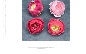 Detailed close-up of four artificial pink peony flower heads for DIY wedding decor
