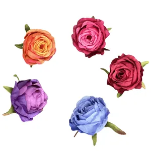 Artificial silk rose flower heads in multiple colors for wedding and home decoration