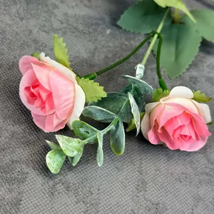 Realistic artificial 10-head pink rose bouquet with gradient petals and frosted green leaves