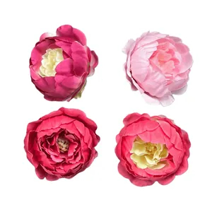 Four realistic faux peony heads in pink and rose shades for DIY wedding floral decor