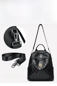 Détail de la bandoulière amovible et des ferrures dorées de qualité sur le sac à dos