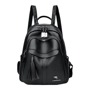 Black pebbled leather backpack with tassel detail and silver kangaroo logo on white background