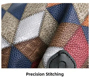 Macro shot of precision dense stitching on patchwork pebbled leather tote bag