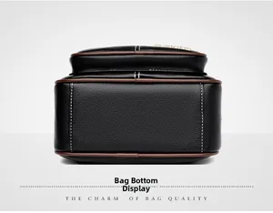 Macro view of the bag's textured leather bottom with brown edges and white stitching