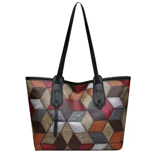 Chic multi-color geometric patchwork tote bag with crocodile texture and long straps
