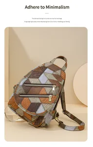 Detail of multi-texture geometric patchwork backpack with gold zippers and snake skin patterns