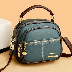 Dark green pebble leather handbag with three-layer zippers and gold kangaroo logo