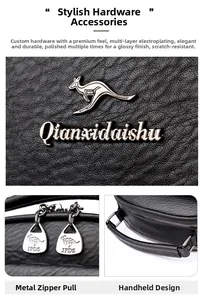 Detailed view of silver hardware, kangaroo logo and textured leather on black doctor bag