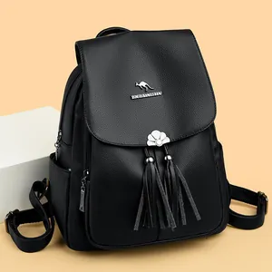 Black pebbled leather backpack for women with kangaroo logo and tassel decorations