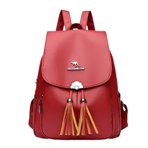 Red lychee grain PU leather backpack for women with kangaroo logo and tassel details