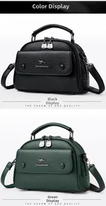 Detail of premium leather textures on black and dark green kangaroo emblem doctor bags
