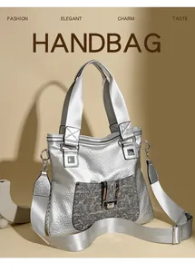 Detail der silbernen Metallic-Handtasche mit Tweed-Tasche und Metallverschluss