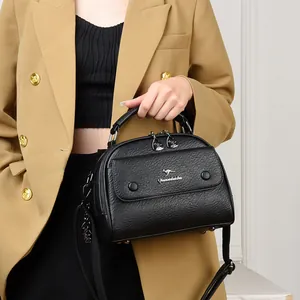 Elegant black lychee grain leather doctor bag with kangaroo logo and adjustable strap