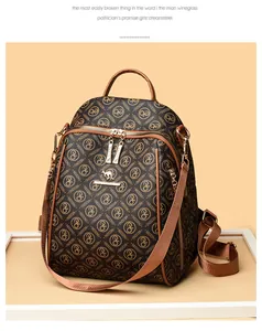 Close-up of golden kangaroo logo and textured vintage print on brown women's backpack