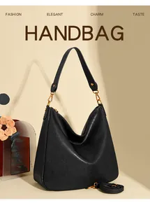 Detail of black soft leather hobo bag with adjustable straps and golden hardware