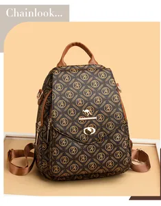 Close-up of brown monogram backpack with gold kangaroo logo and secure metal lock