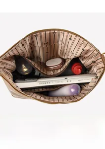 Top view of the spacious interior of this brown tote bag showing multi-layer compartments