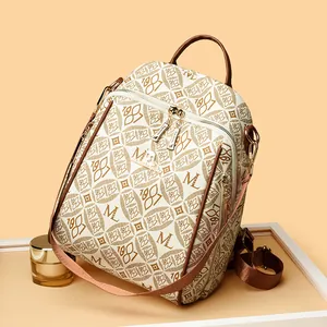 Retro lattice print backpack with M-pattern and gold logo on a champagne background