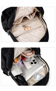 Internal view showing multiple compartments and spacious storage for tablet and umbrella