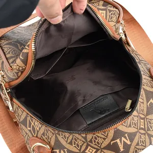 Retro brown PVC backpack with monogram print and spacious inner pockets