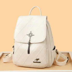 Elegant quilted cream leather backpack with star tassel and chain fringe detail