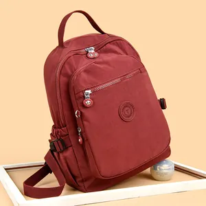 Waterdichte bordeauxrode nylon laptoprugzak voor studenten met meerdere vakken en stevig design