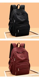 Détail de sacs à dos en nylon doux pour la peau en noir et bordeaux de haute qualité