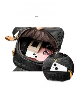 Black pebbled leather backpack with large main compartment and practical back security pocket