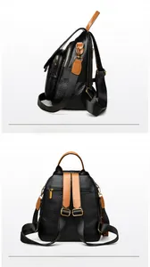 Detail of black pebbled leather punk backpack with gold hardware and anti-theft back pocket
