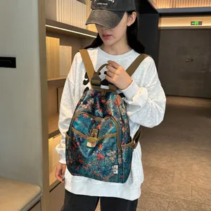 Vintage floral canvas backpack with bamboo leaf print and front buckle for travel