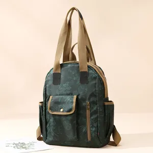 British style waterproof backpack with dark green floral pattern and large capacity